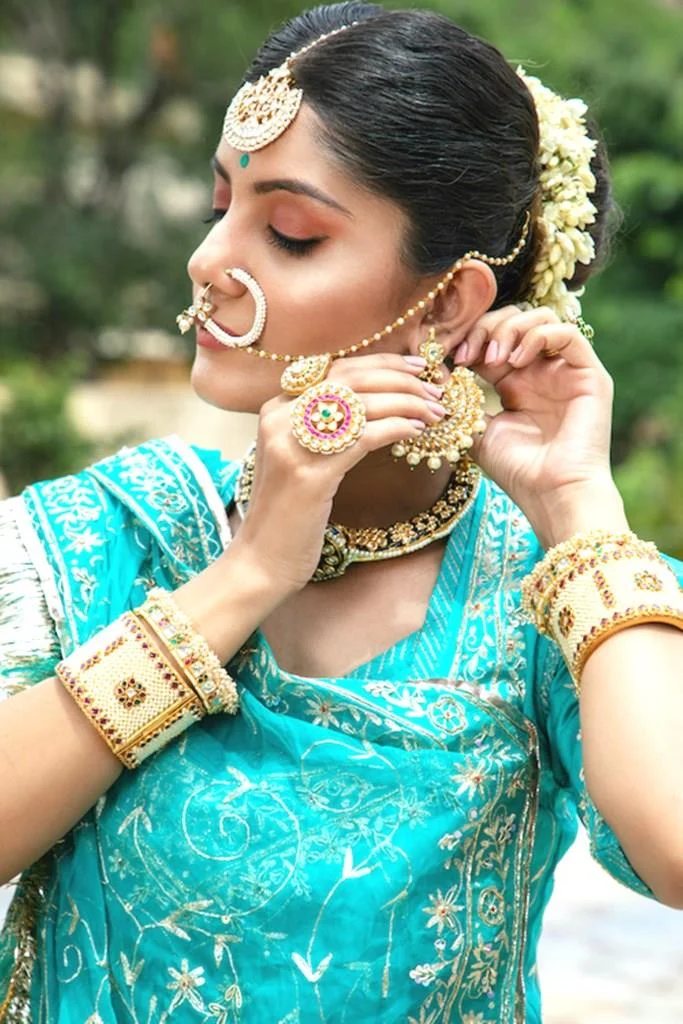 Woman wearing Krishna Gold Jewellery